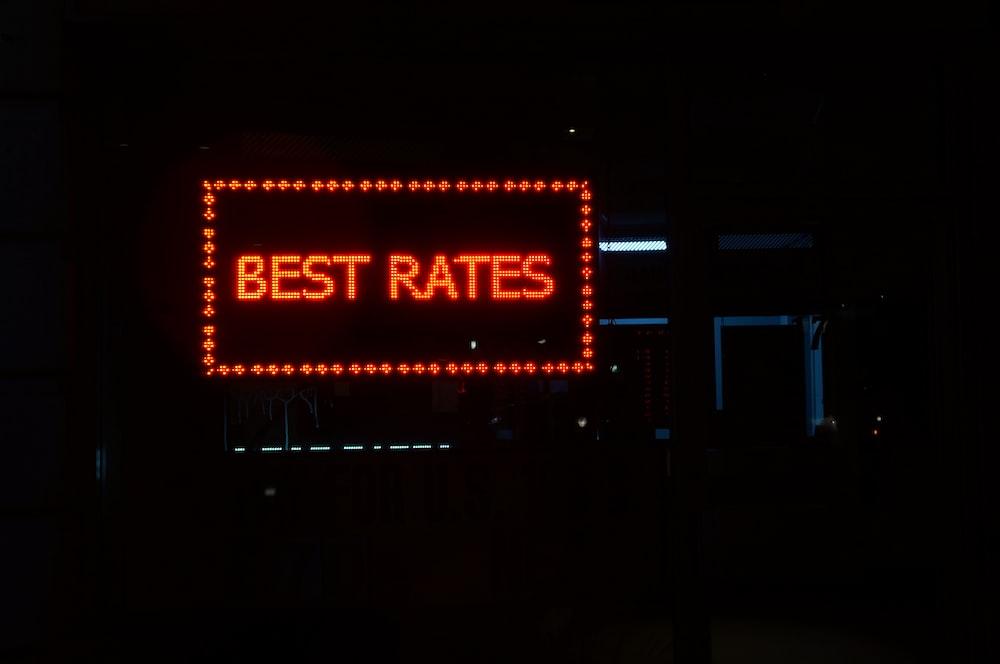 a sign saying best rates. 