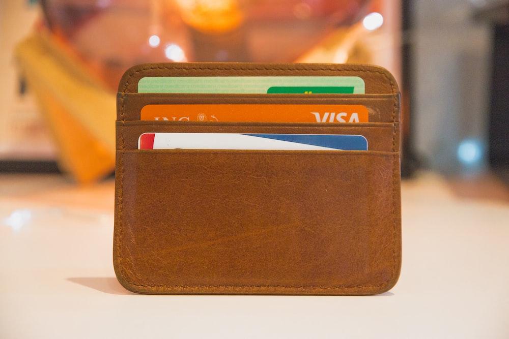 Credit cards in a brown wallet