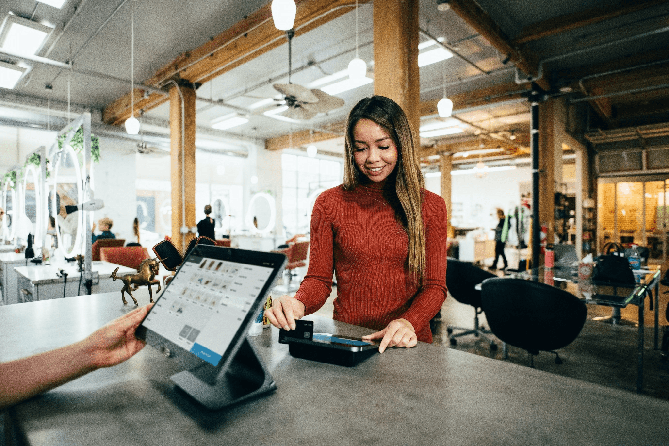 a woman using a credit card