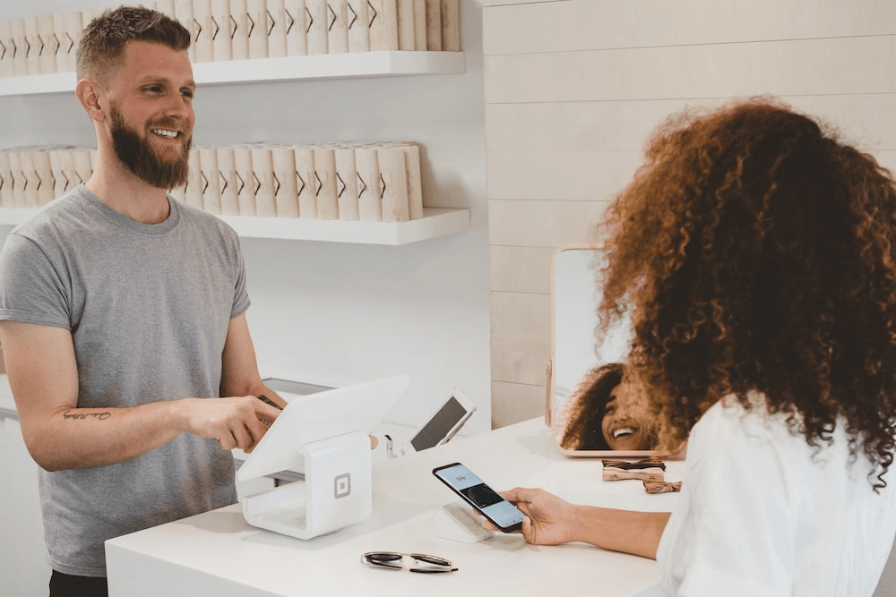 person paying via phone